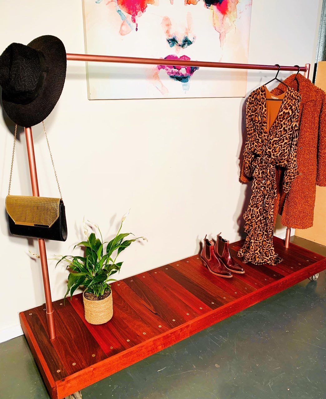 Elegant Rose Gold open Wardrobe with Jarrah Flooring