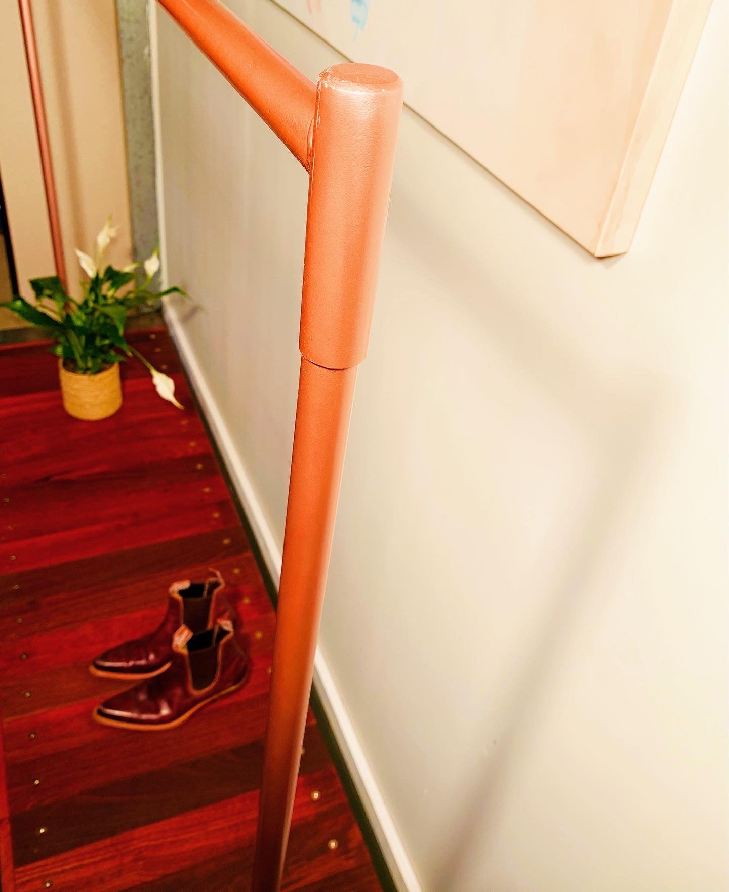 Elegant Rose Gold open Wardrobe with Jarrah Flooring